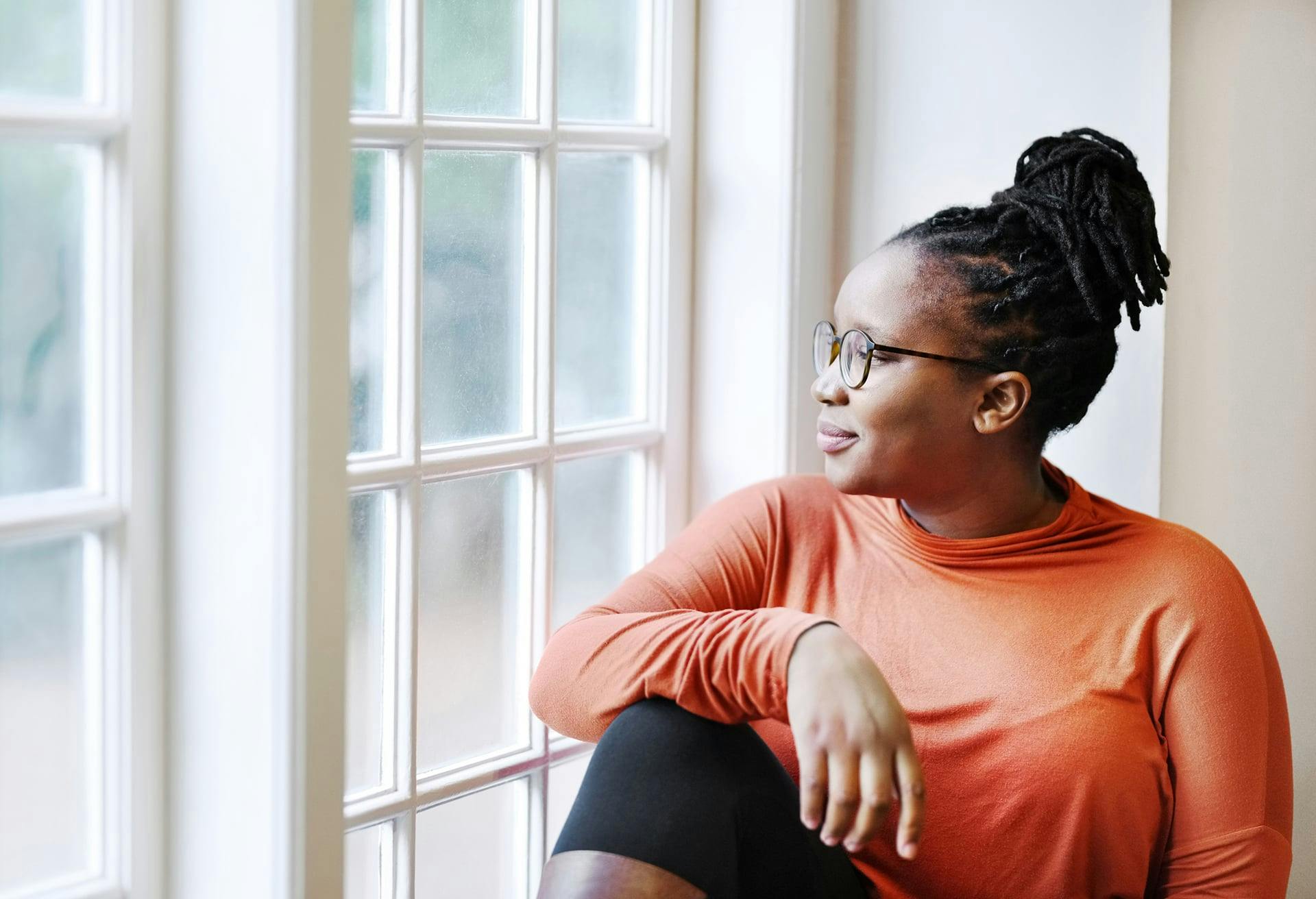 Woman in an orange shirt