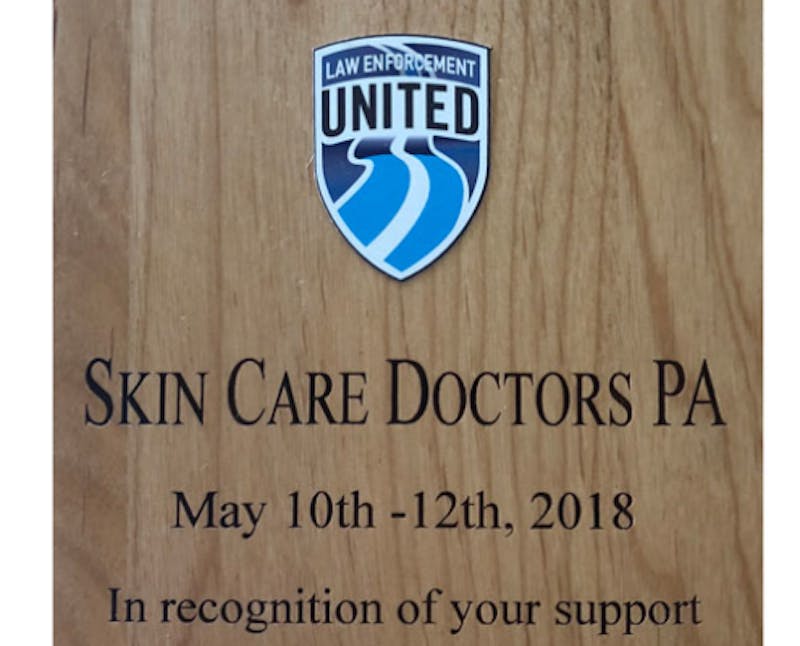 close up picture of 2018 Law Enforcement United award to Skin Care Doctors