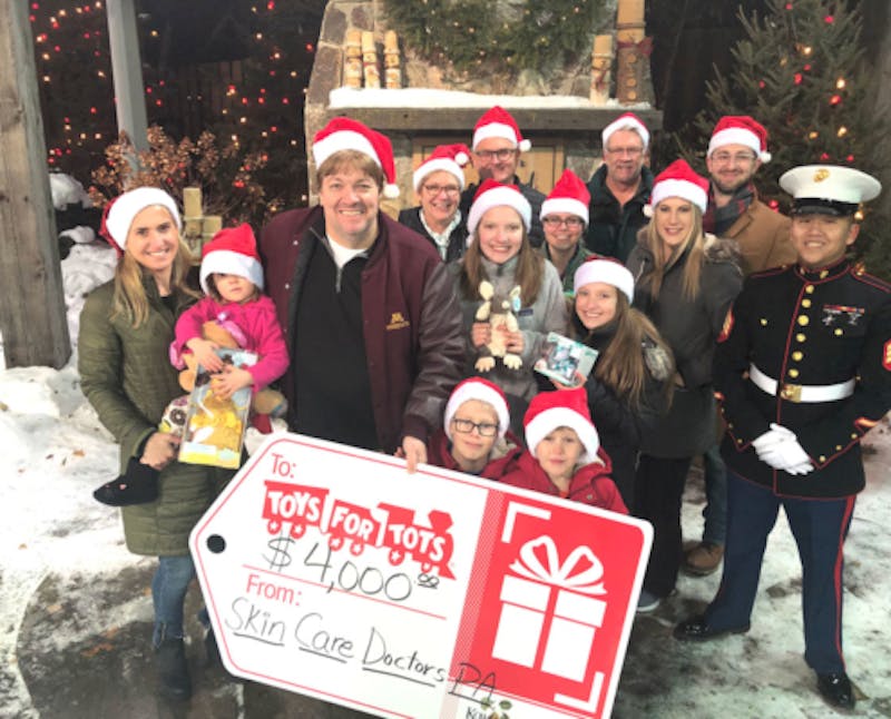 picture of Toys for Tots donation by Skin Care Doctors team