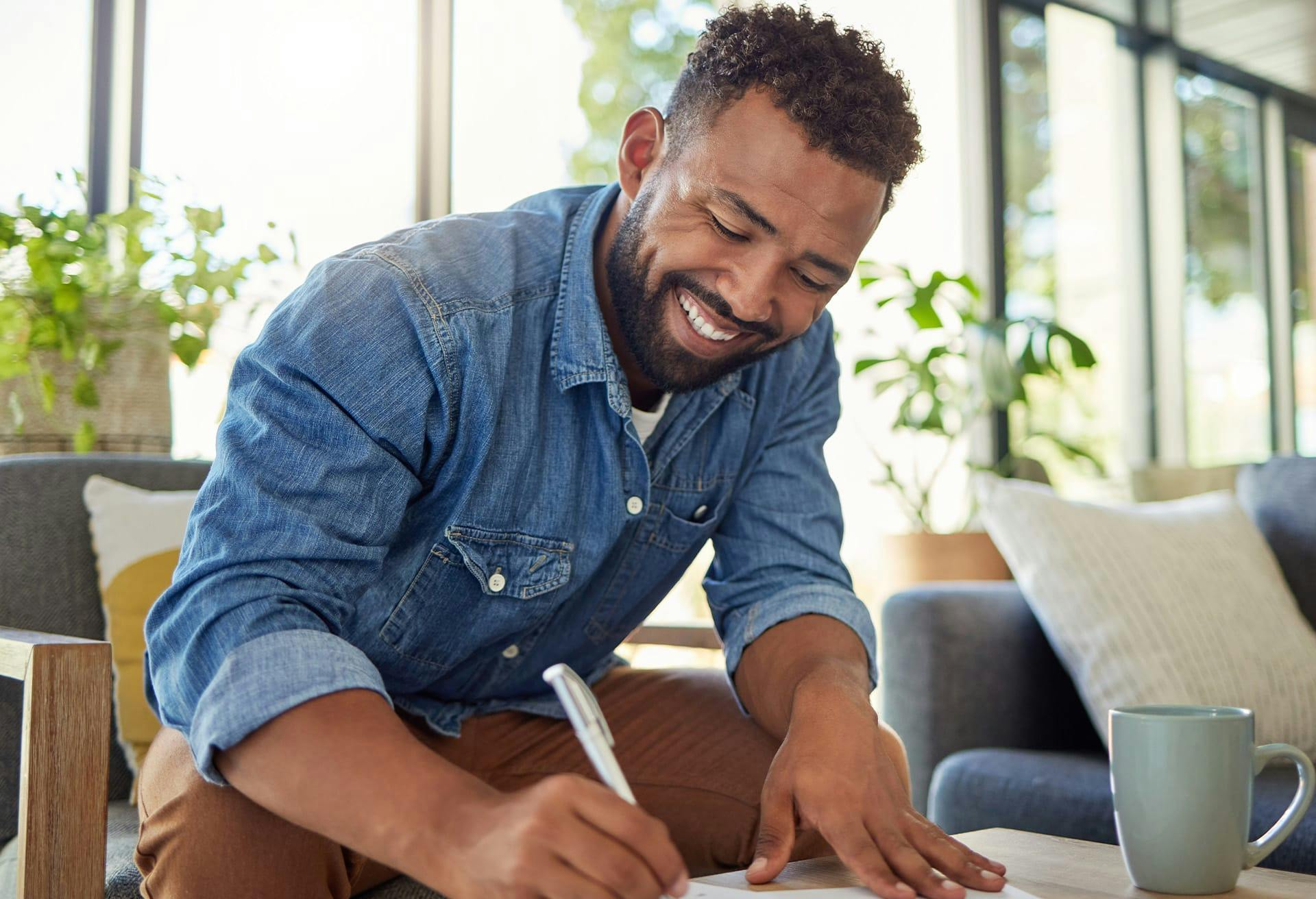 Man writing something down