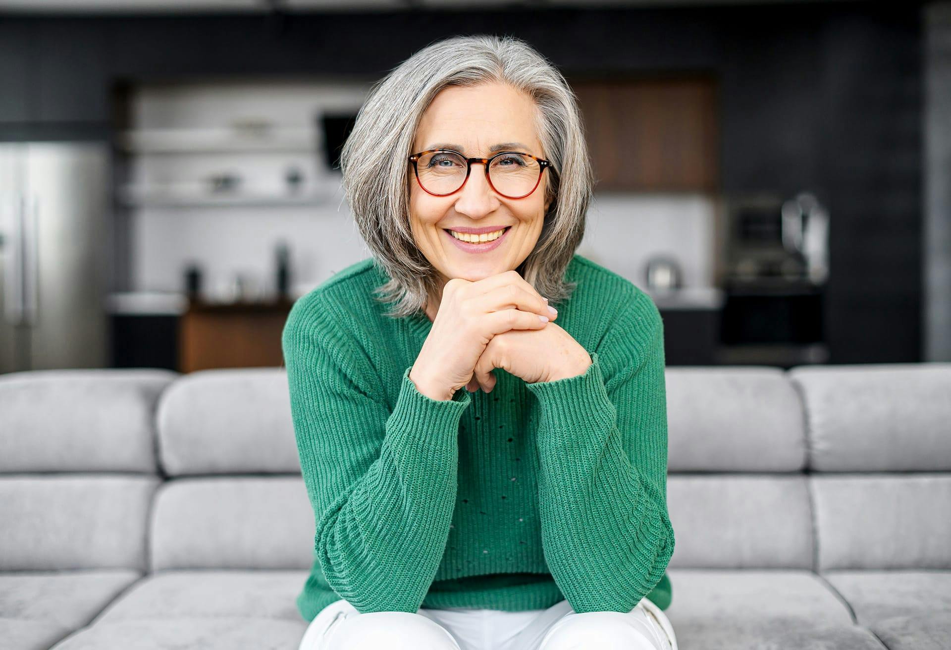Woman wearing a green sweater
