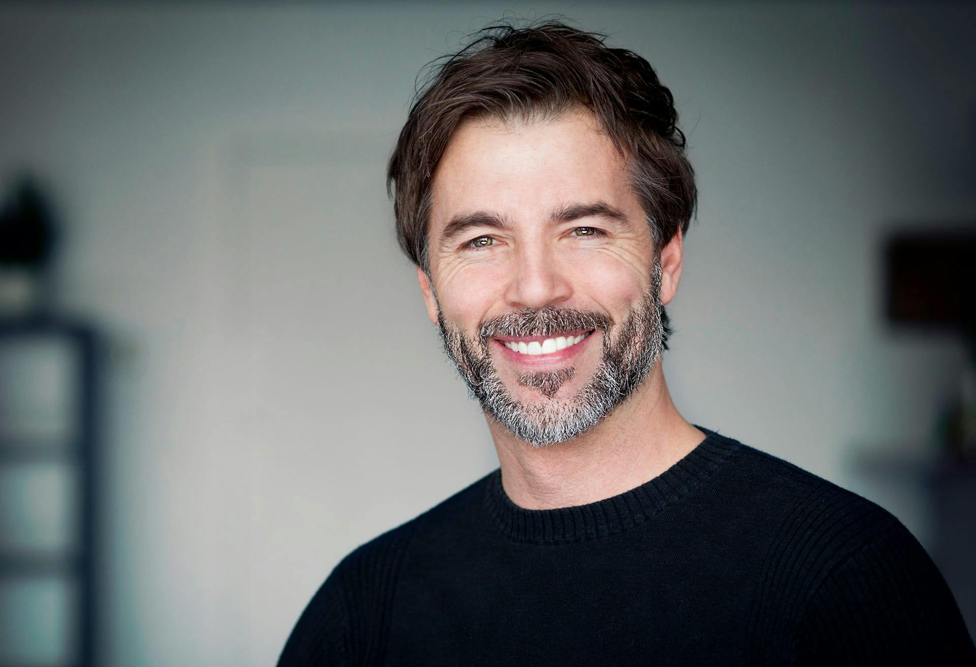 Man with salt and pepper facial hair