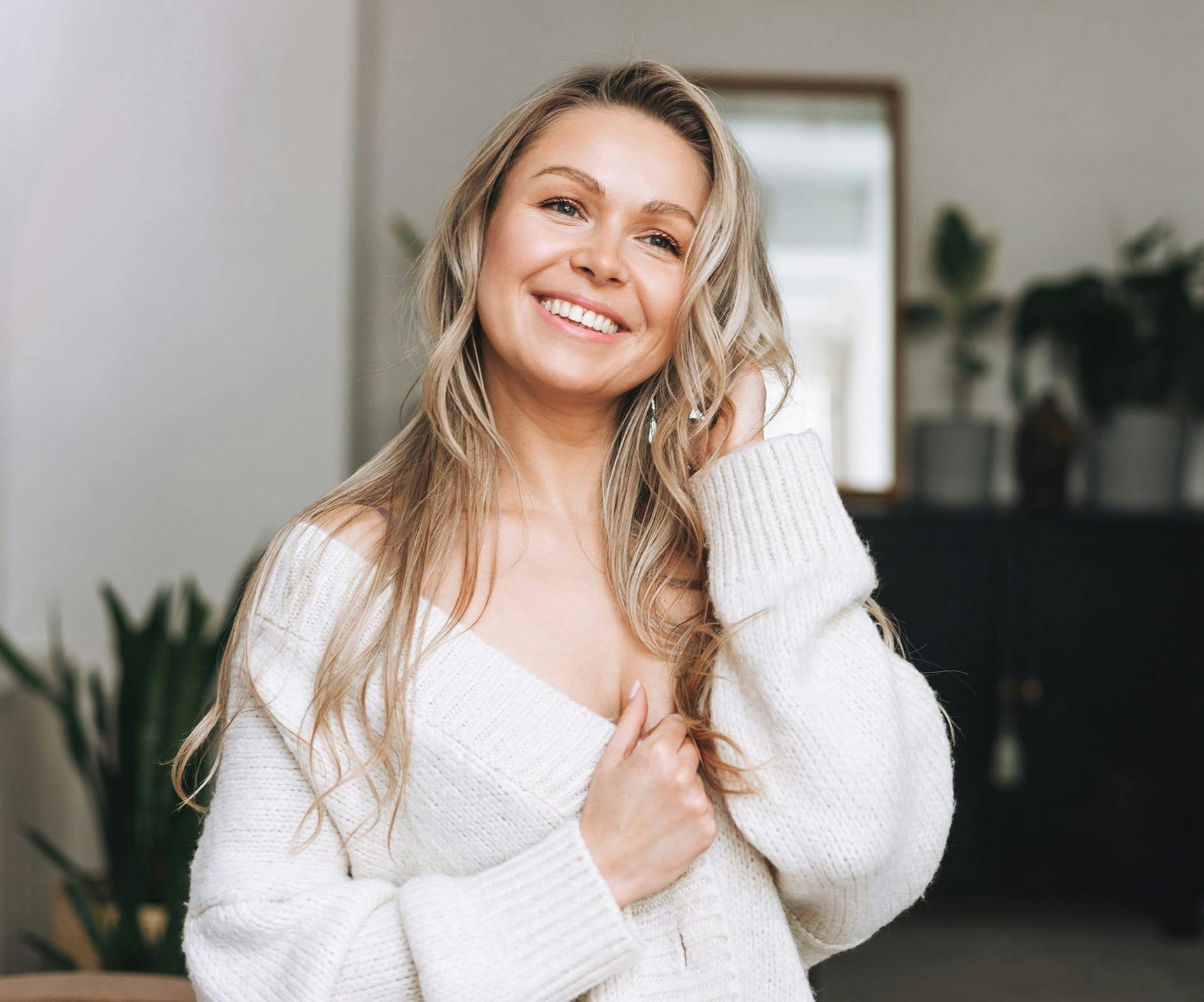 Woman wearing a white sweater