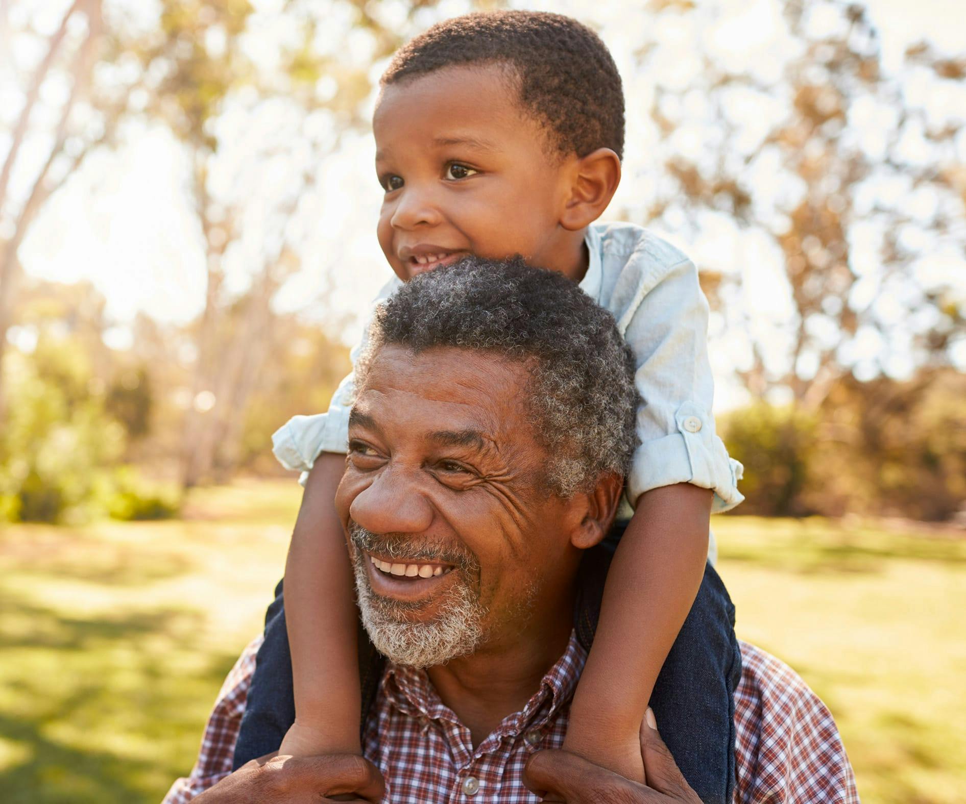 Man with a child on his shoulders