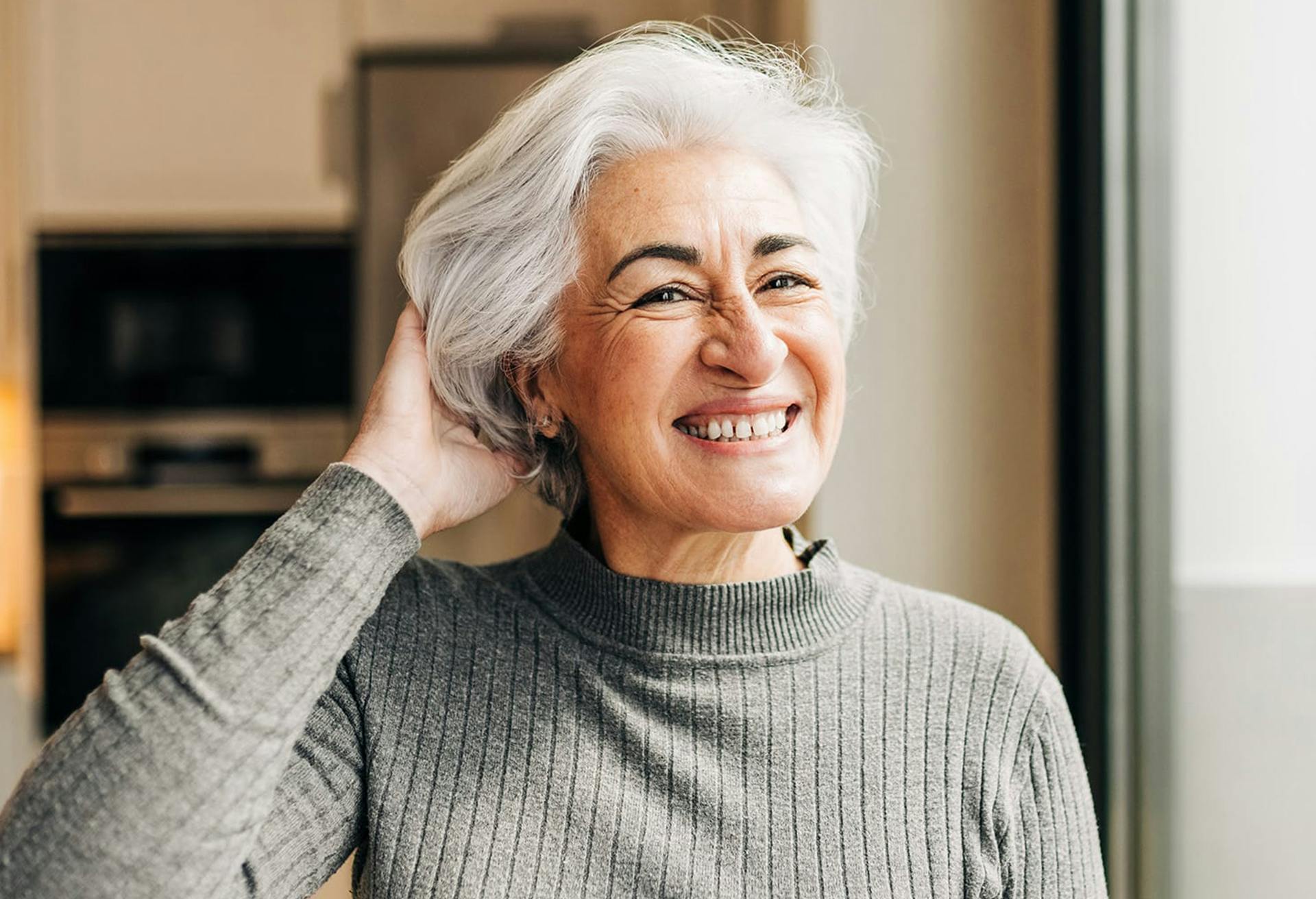 Woman with short grey hair