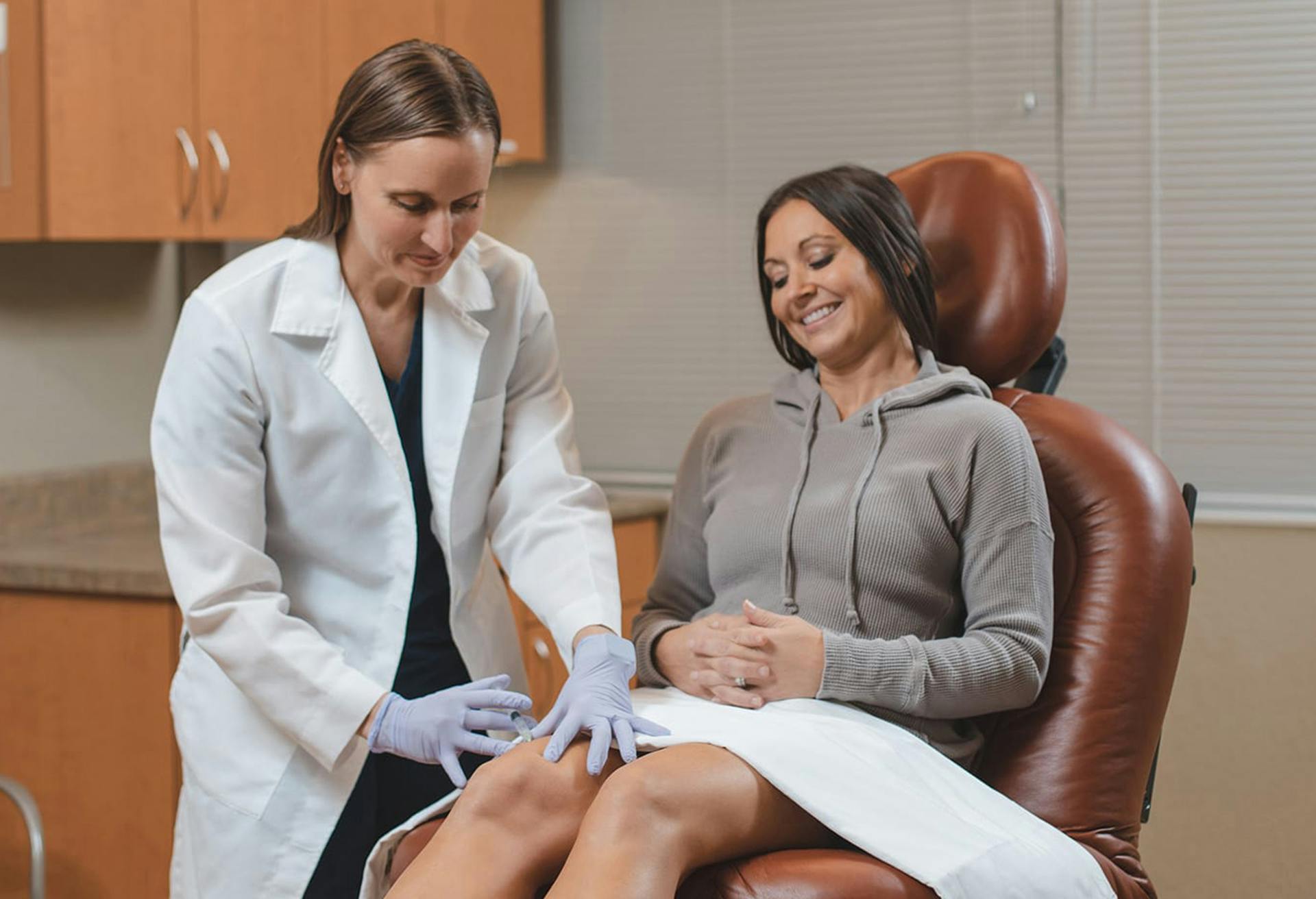 Margaret Spartz, MD with a female patient