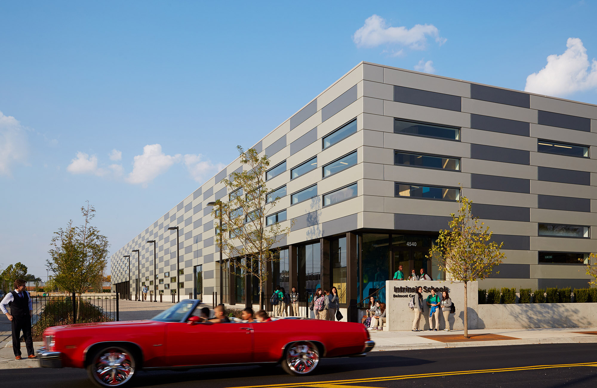 Red convertible in front of the Intrinsic School in Chicago