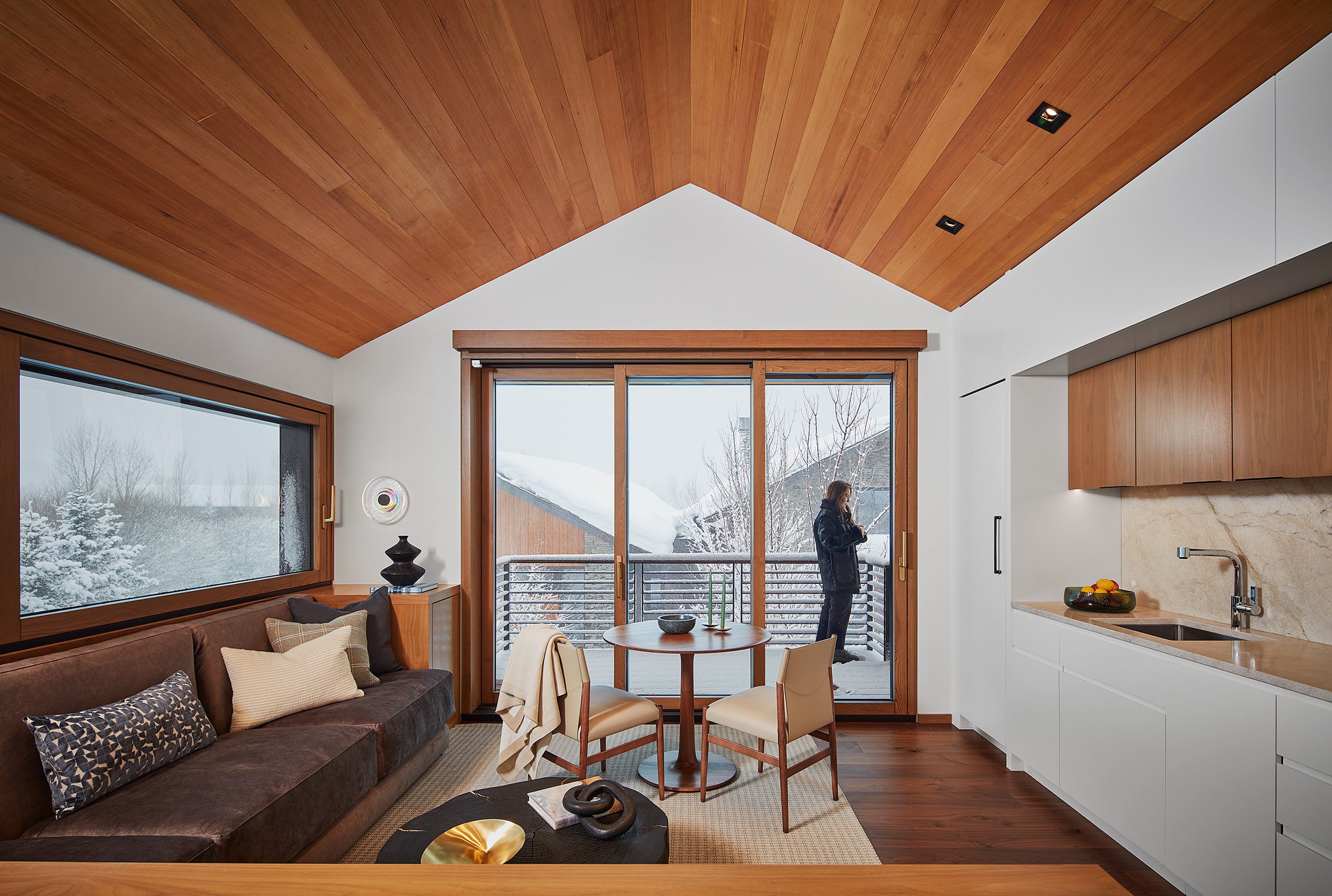 Living room and kitchen of a snug guest house