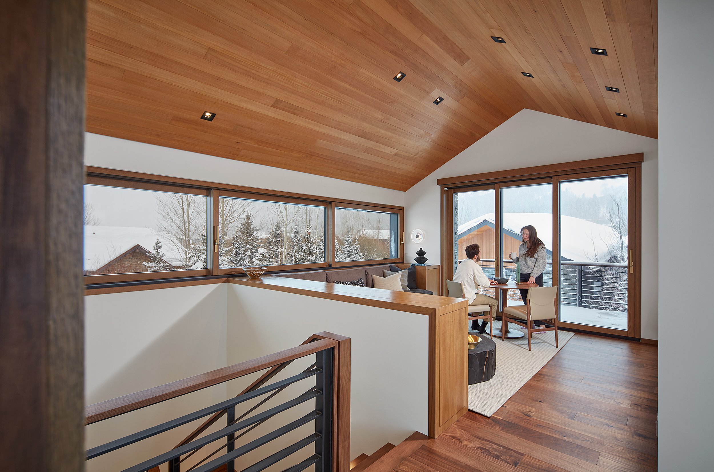 Living room and dining of a snug guest house in Teton Village