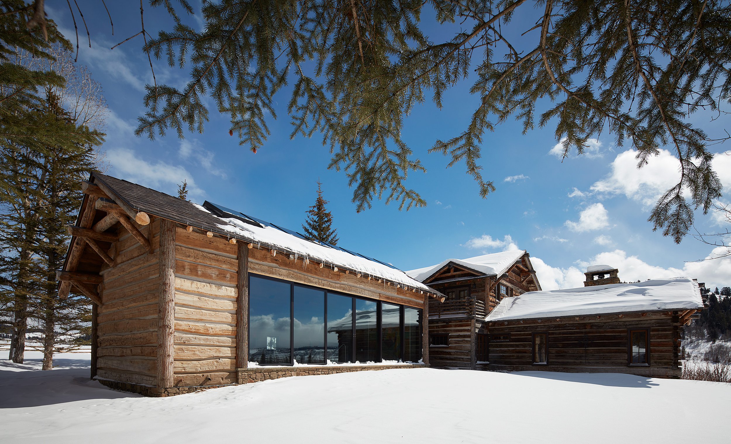 Cabin pool house exterior in the winter