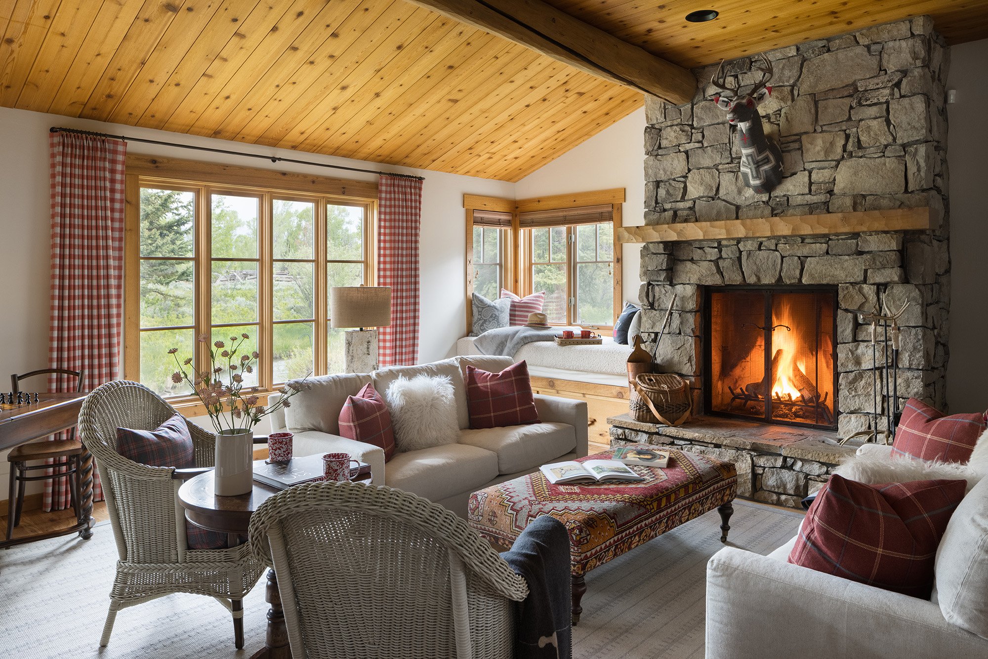 Cabin living room with stone wood stove