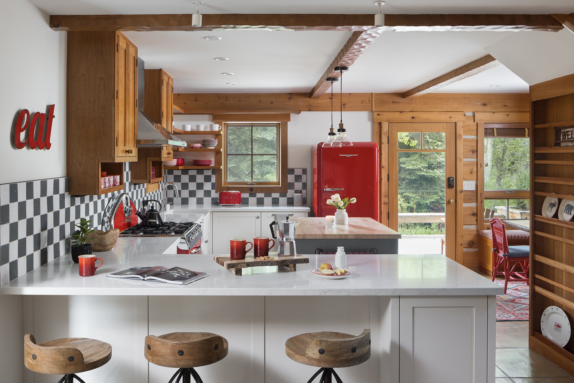 Red and white checkered kitchen in a cabin