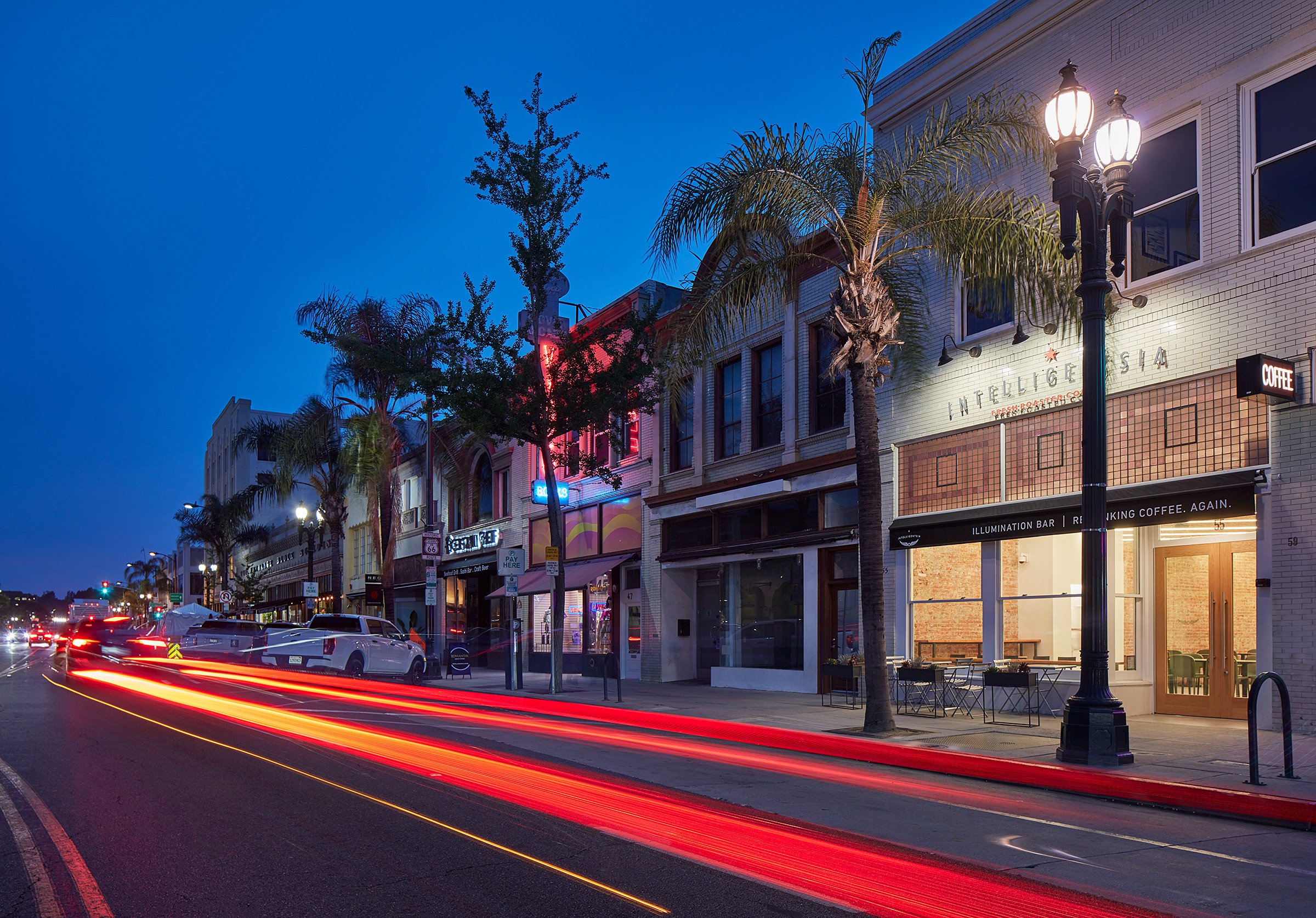 night time street view of intelligentsia with car tail lights