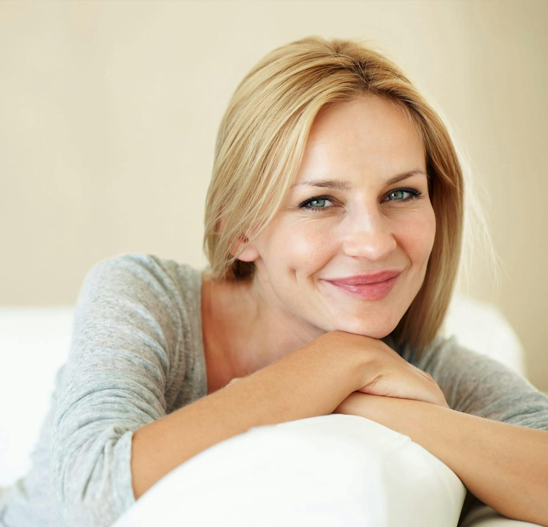 Woman resting on couch