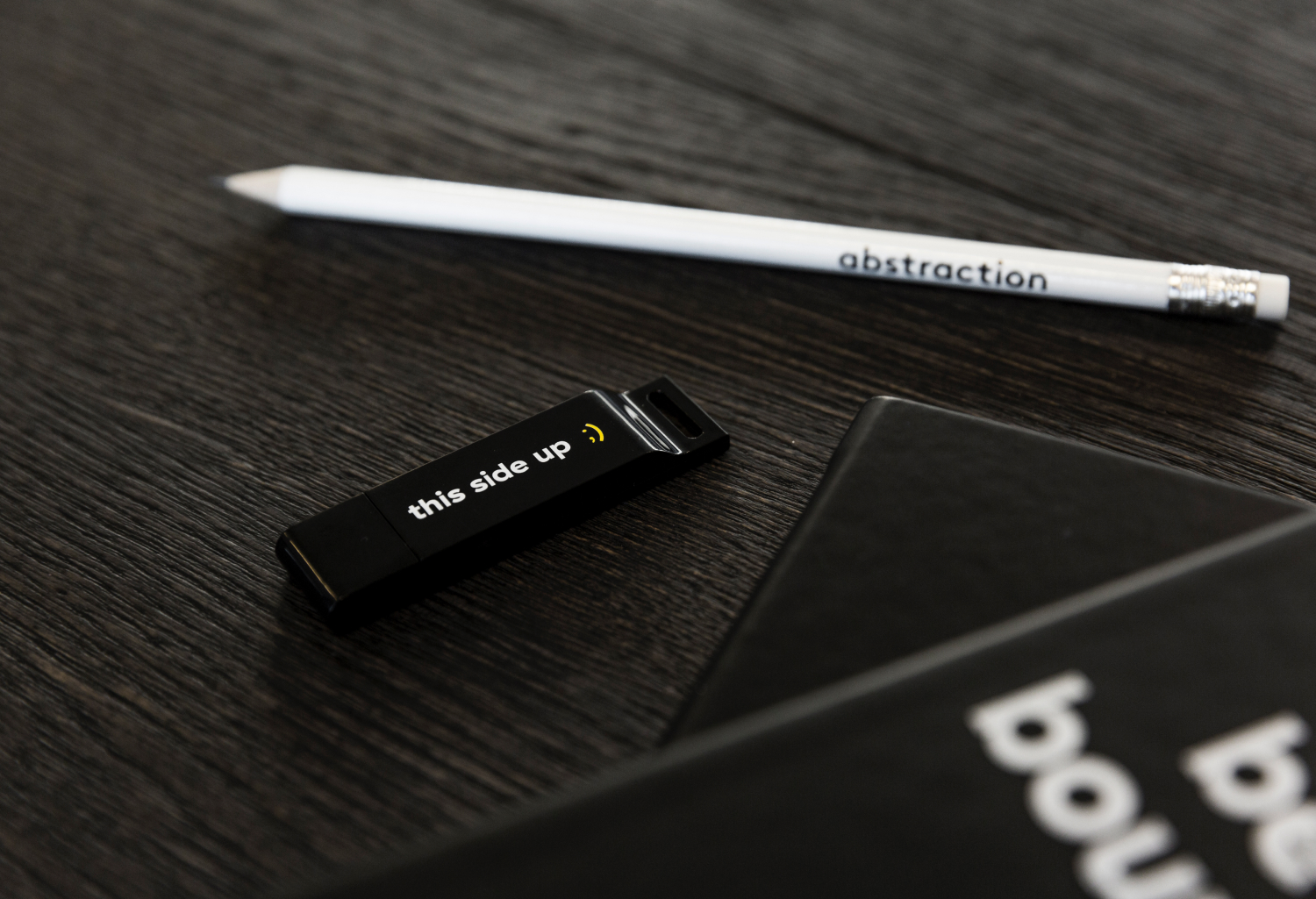 Abstraction - pencil, USB-stick and booklet