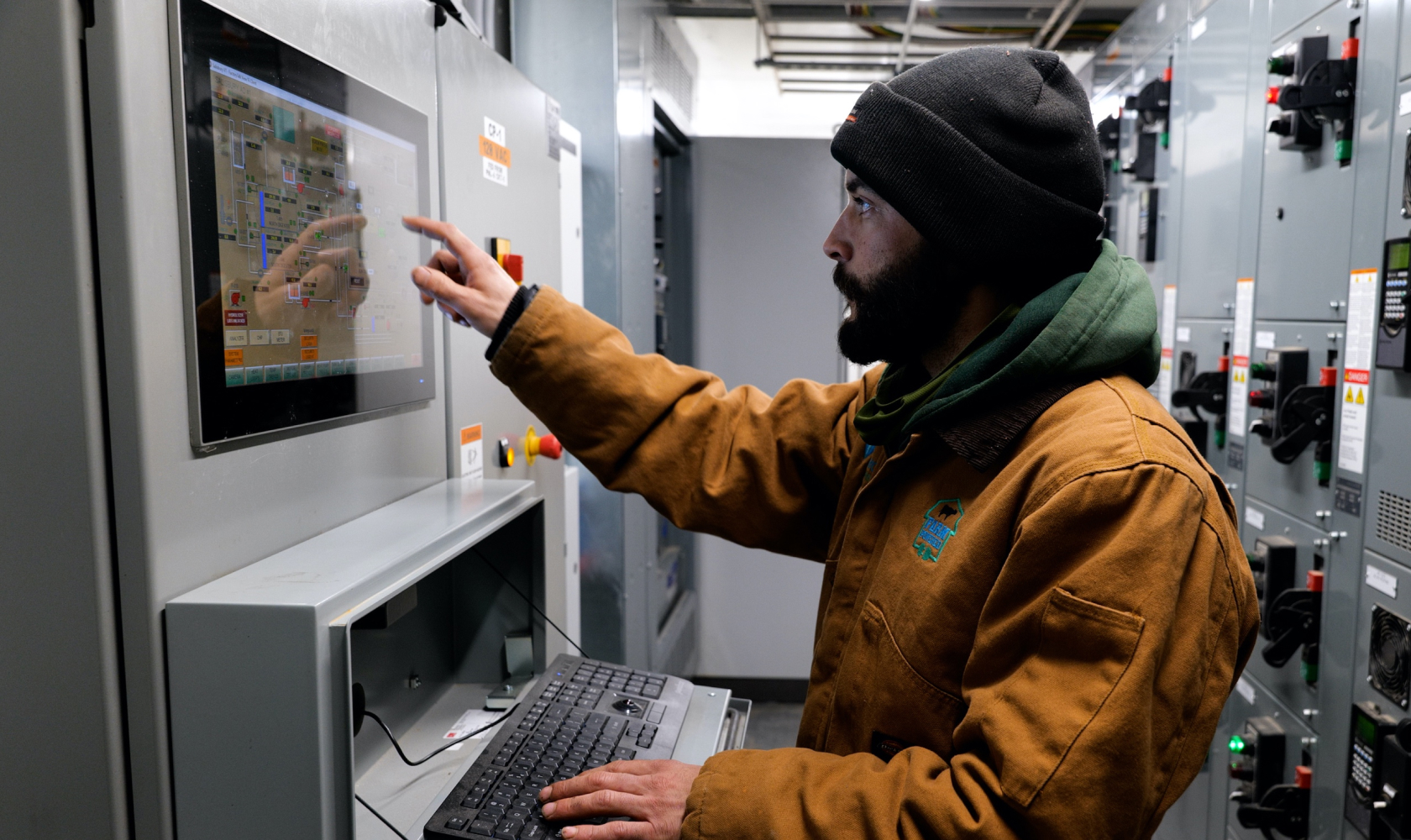 Vanguard Renewables employee in a farm powered anaerobic digester facility