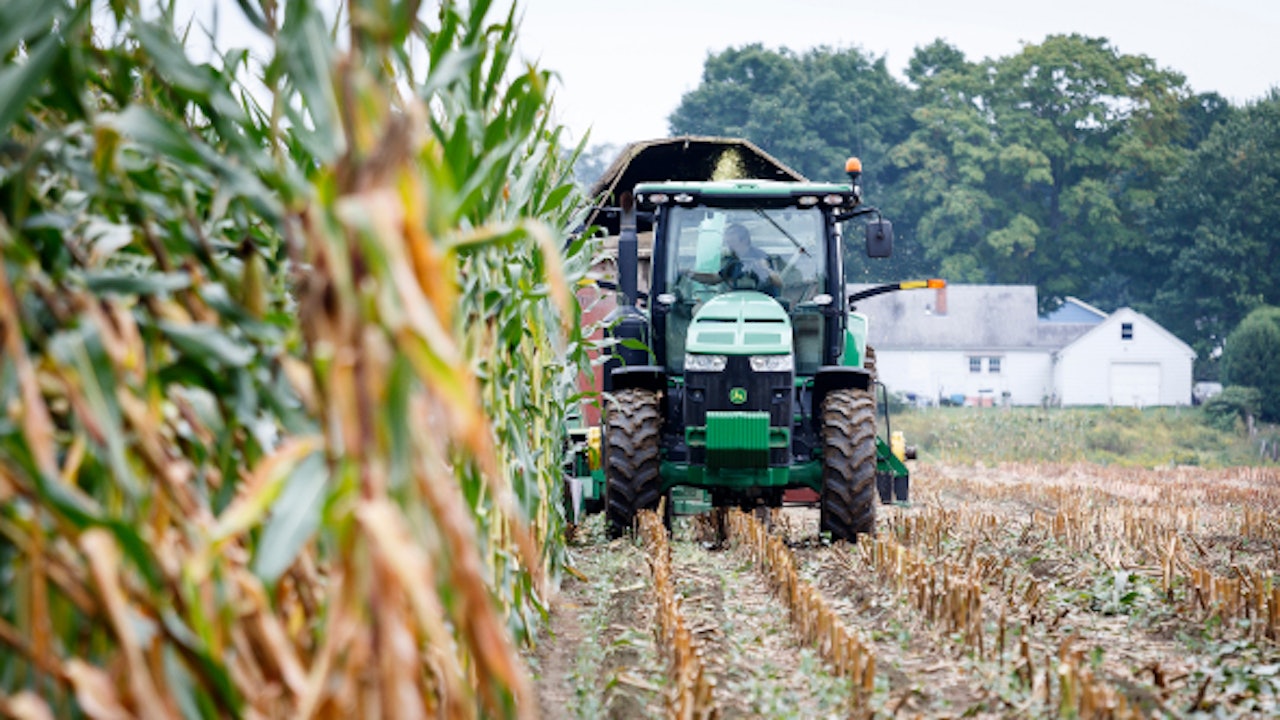 Tractor on a regenerative agriculture field with manure management