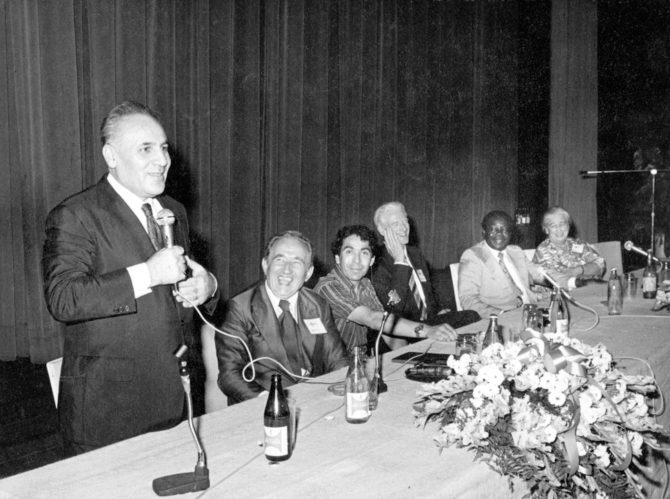 Hands of the Cause Rahmatu’lláh Muhájir (left), Paul Haney (fourth from left), Enoch Olinga (second from right) in Bahia, Brazil, January 1977