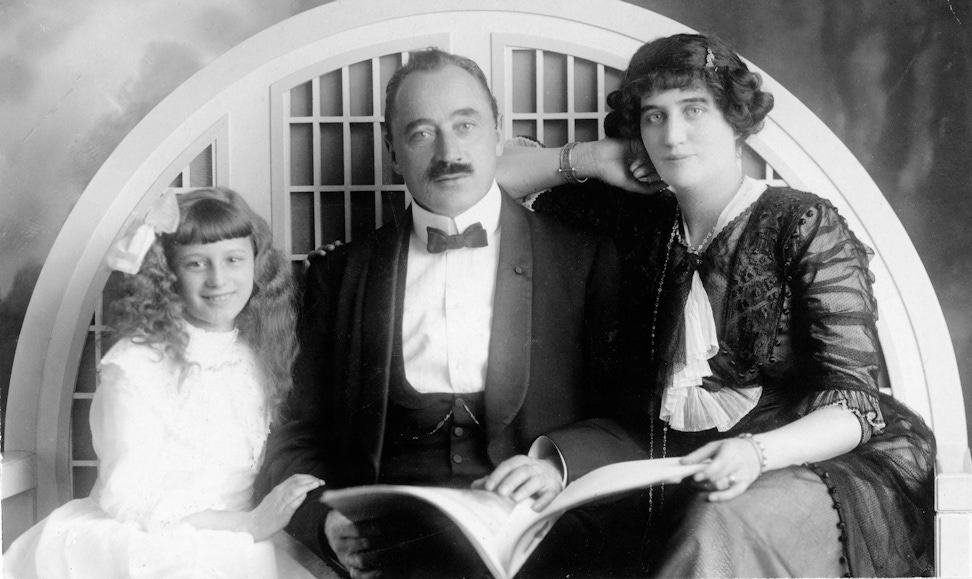 The first Bahá’ís of Switzerland, Dr. Joseph de Bons and his wife, Edith de Bons, with their daughter, Mona, in 1911
