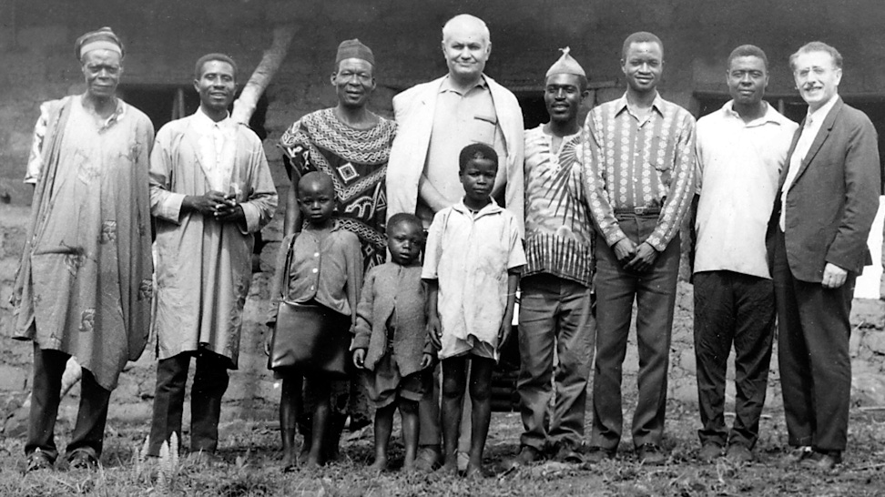 Hand of the Cause `Alí-Muhammad Varqá (center) and Mihdi Samandari (far right) with Bahá’ís of Nkwen, Cameroon in 1972