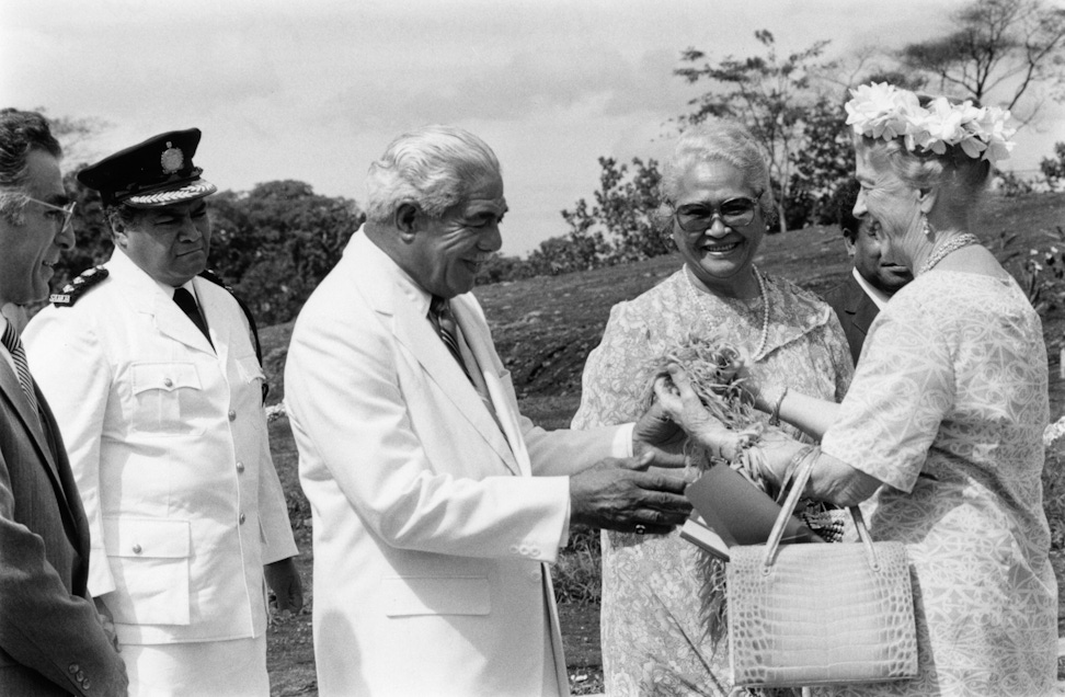 Madame Ruhiyyih Rabbani, a Hand of the Cause, (right) is greeted by the Head of State of Samoa, His Highness Susuga Malietoa Tanumafili II, and his wife, Masiofo Lili Tuni Malietoa, at the dedication of the Samoan Temple, 1984. At far left is Suhayl Ala’i, a member of the Continental Board of Counsellors