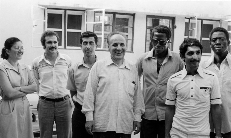 The Hand of the Cause Rahmatullah Muhajir (fourth from left) with some Bahá’ís of The Gambia during a visit he made to the country