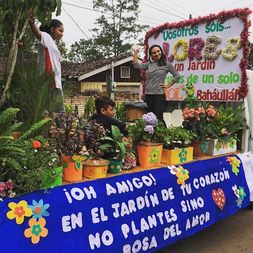 The Bahá’í community of Siguatepeque, Honduras, participated in the Flower Festival parade in their community, sharing about the upcoming bicentenary of the birth of Bahá’u’lláh in October 2017. Their float was decorated with quotations from the teachings of Bahá’u’llah, including: <q>O Friend! In the garden of thy heart plant naught but the rose of love ....</q>