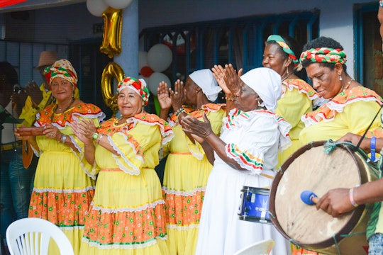 A group performs during a celebration of the bicentenary of the birth of Bahá’u’lláh in Norte del Cauca, Colombia, in October 2017.