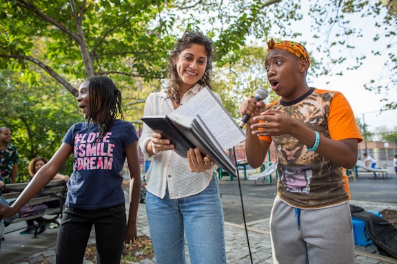 Young people in New York, United States, channel the joy and spirit of the bicentenary of the birth of Bahá’u’lláh through the arts in neighborhood picnic in October 2017.