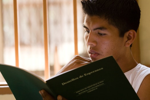 A group studying the spiritual empowerment of junior youth at the Baha'i centre in Montero, Bolivia