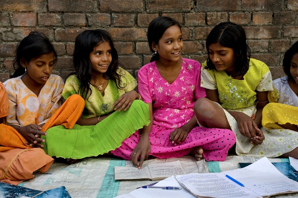 A group studying the spiritual empowerment of junior youth in Biharsharif, India