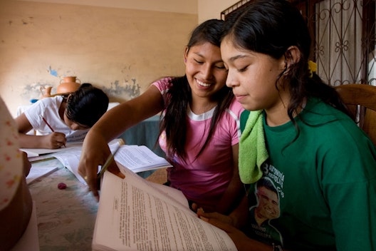 A group studying the spiritual empowerment of junior youth at the Baha'i centre in Montero, Bolivia