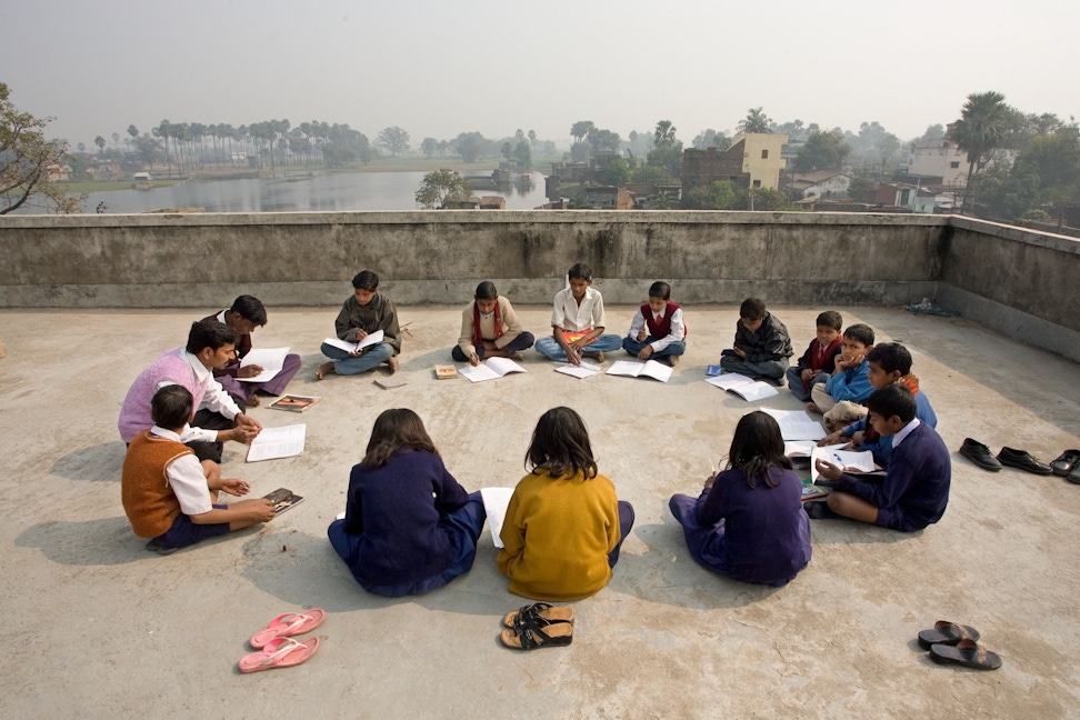 A group studying the spiritual empowerment of junior youth in Biharsharif, India