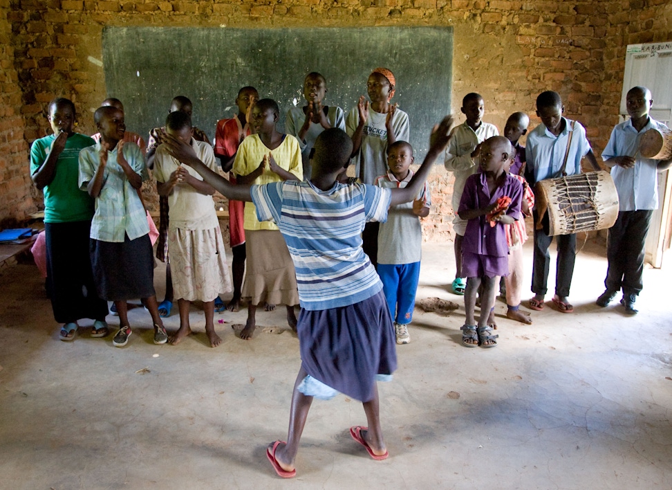 A group of youth singing Bahá’í prayers in Kakamega, Kenya