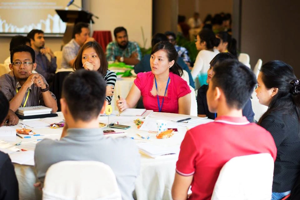 Attendees participate in a roundtable discussion at the recent conference on the role of youth in society in Kuala Lumpur, Malaysia