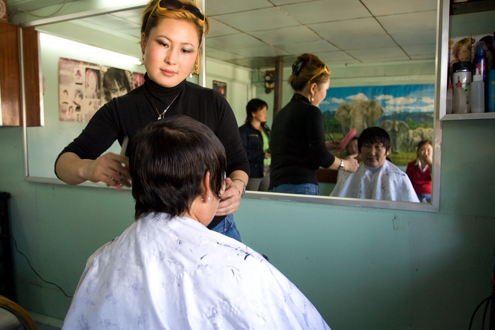 A hairdresser in Murun, Mongolia who was able to expand her business because of her involvement in a community bank