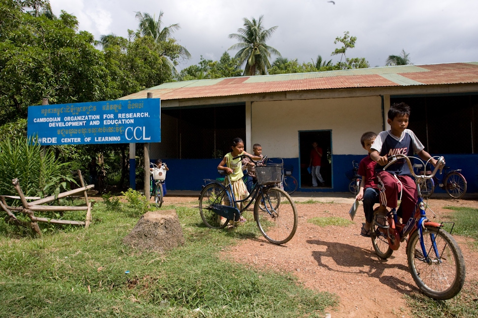 Students leaving a CORDE Center of Learning established by Cambodian Organization for Research, Development and Education, a Bahá'í-inspired organization in Battambang, Cambodia, focused on education