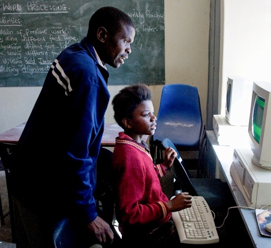 A computer lesson at Bambino School, a Bahá'í-inspired school in Lilongwe, Malawi