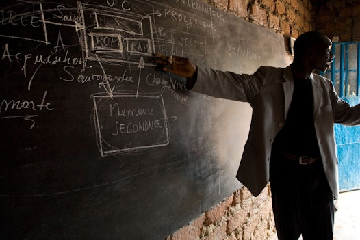 A teacher at Anis School, a Bahá'í-inspired school in Lubumbashi, DRC