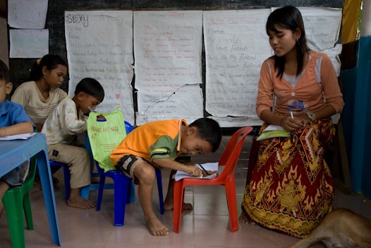 A class for children at a CORDE Center of Learning established by Cambodian Organization for Research, Development and Education, a Bahá'í-inspired organization in Battambang, Cambodia, focused on education