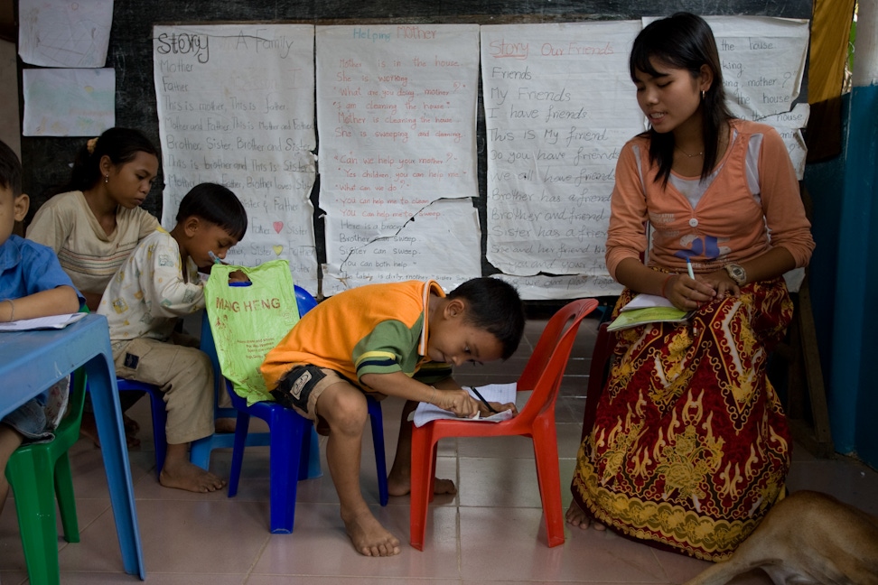 A class for children at a CORDE Center of Learning established by Cambodian Organization for Research, Development and Education, a Bahá'í-inspired organization in Battambang, Cambodia, focused on education