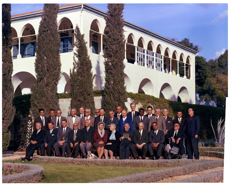 Members of the Universal House of Justice with the Hands of the Cause in front of the Mansion of Bahjí, 1963