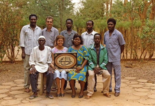 National Spiritual Assembly of the Bahá’ís of Burkina Faso with two Auxiliary Board Members, 1990