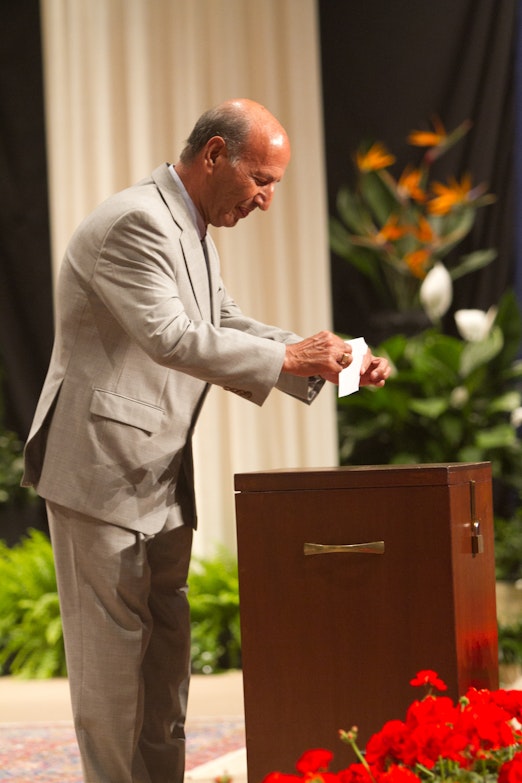 Delegate casting ballot at the 11th International Convention, Haifa, 2013