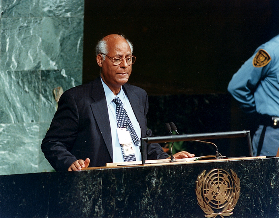 Techeste Ahderom, principal representative of the Bahá’í International Community to the United Nations, speaking before the Millenium Summit, September 2001 in his capacity as co-chairman of the Millennium Forum