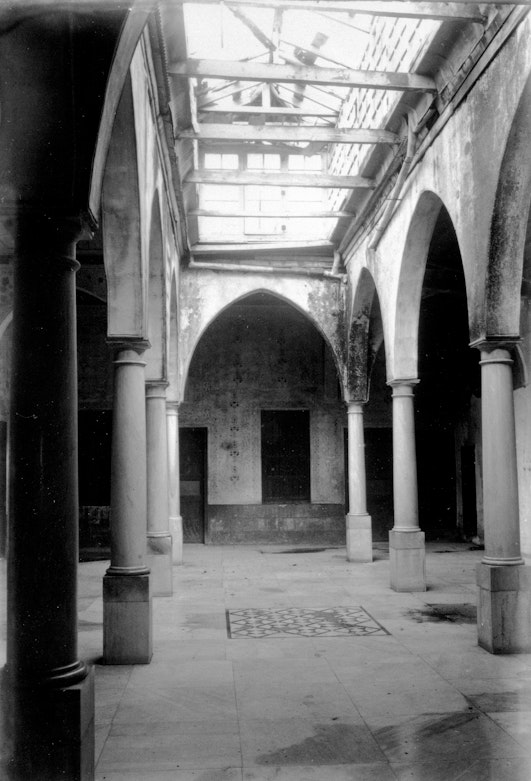 The main hall of the Mansion of Bahjí just before the Guardian began its restoration, 1929