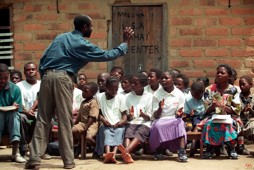 A community gathering at the Local Bahá’í Centre in Ntambo, Zambia