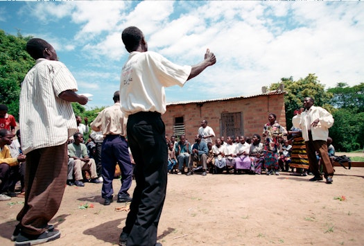 A community gathering at the Local Bahá’í Centre in Ntambo, Zambia