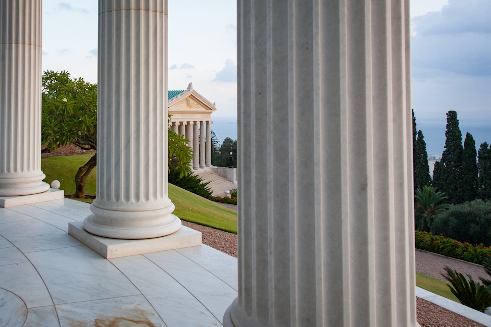 International Archives Building seen through the columns of the Centre for the Study of the Sacred Texts