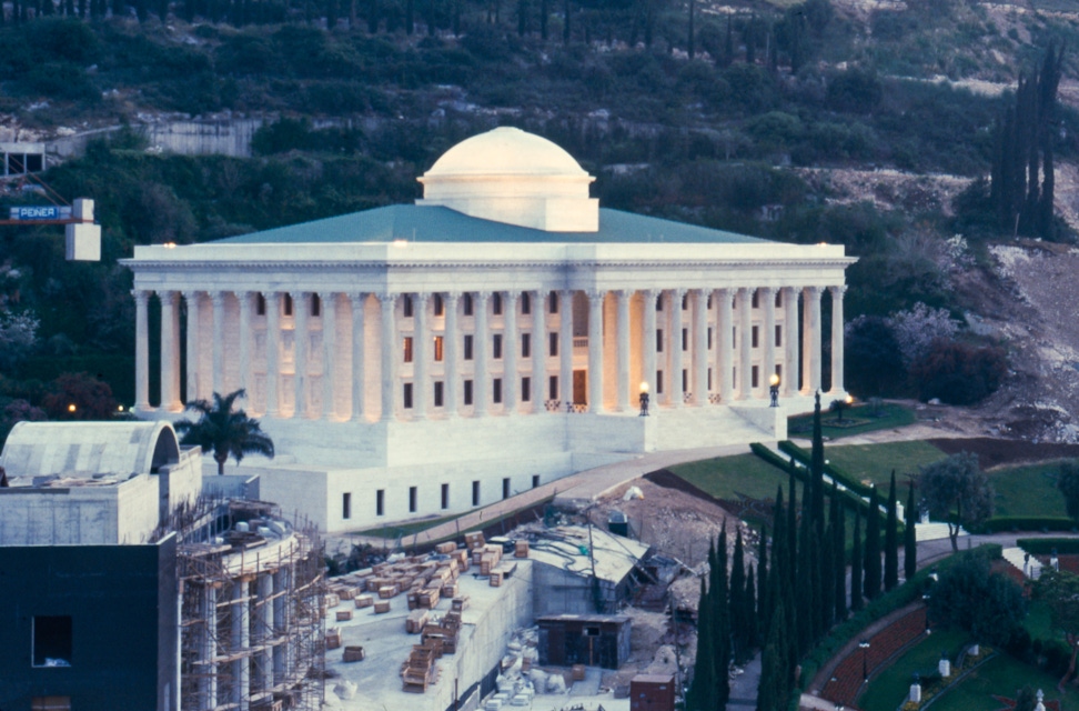 Seat of the Universal House of Justice (centre) during the construction of the International Teaching Centre (left) on the Arc